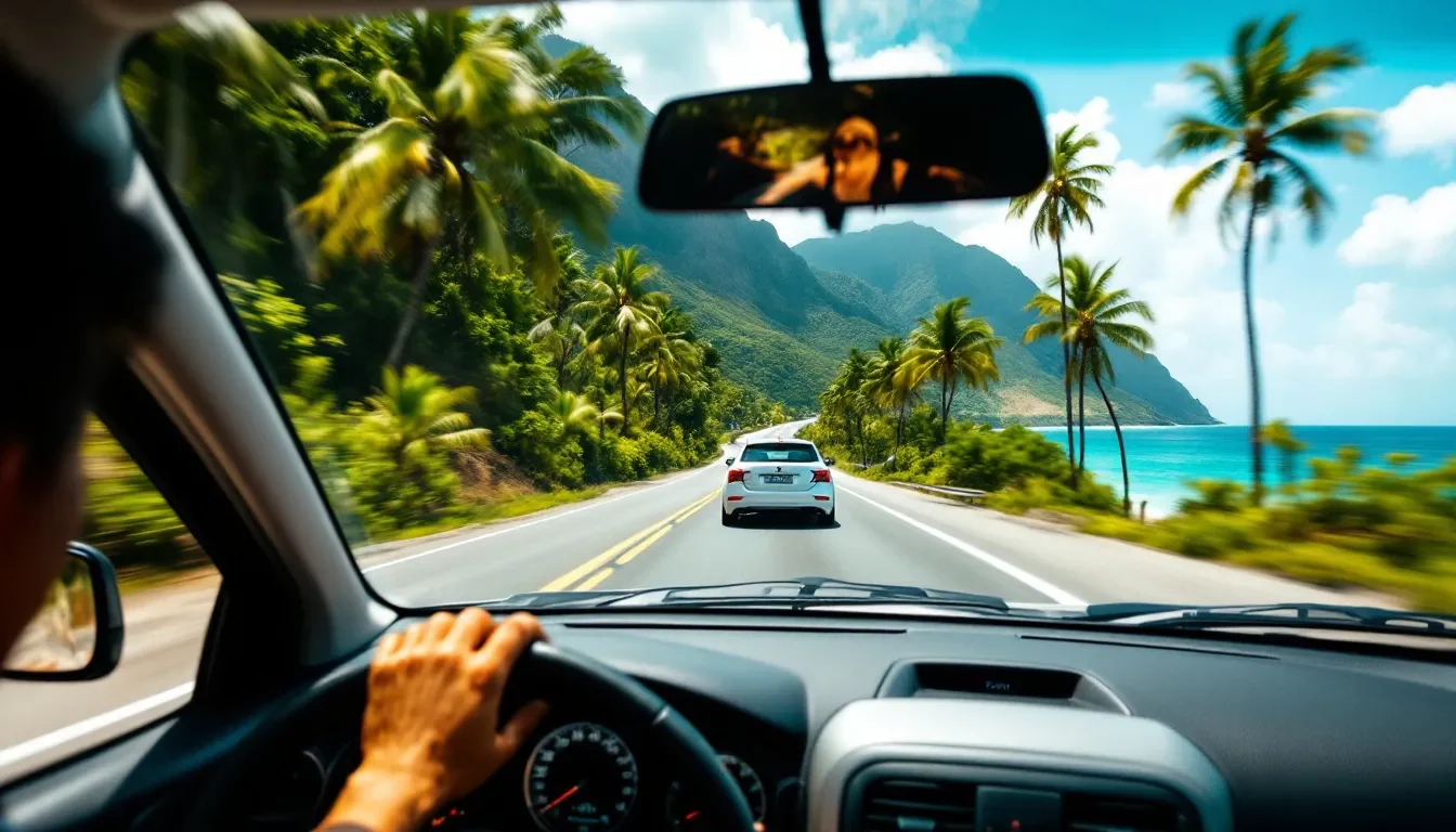 Vue depuis l’habitacle d’une voiture de location sur la route côtière de la Basse-Terre face à la mer