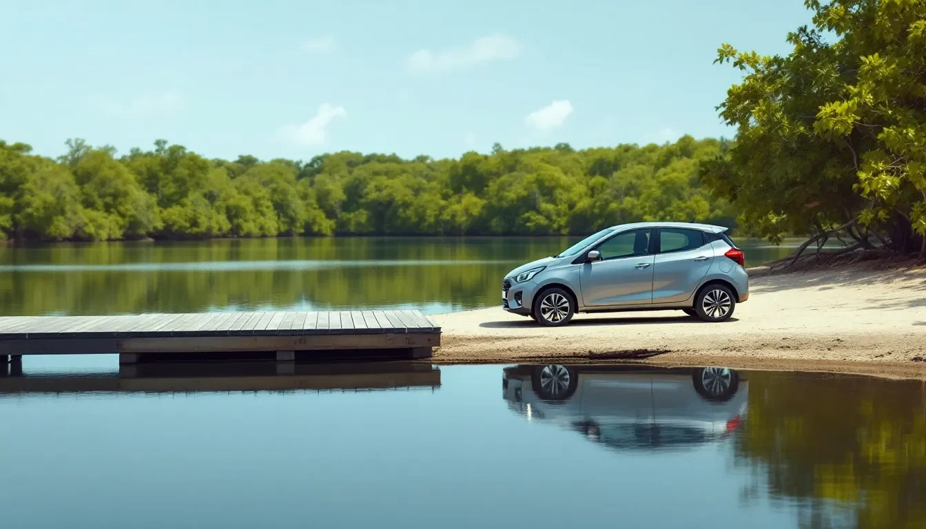 Voiture de location stationnée sur la berge, face au ponton et à la mangrove en Guadeloupe
